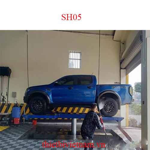 Cầu nâng 1 trụ Ấn Độ lắp đặt bàn nâng âm nền chữ I SH05